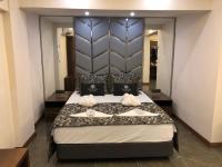 Postel nebo postele na pokoji v ubytování Venus Hotel