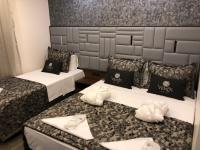 Postel nebo postele na pokoji v ubytování Venus Hotel