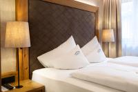 Posteľ alebo postele v izbe v ubytovaní Olympia-Relax-Hotel Leonhard Stock