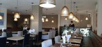 FLY INN Madagascar HOTEL - Navette GRATUITE H24 - à 300m de l'Aéroport International Ivato-Antananarivoにあるレストランまたは飲食店