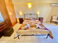 Posteľ alebo postele v izbe v ubytovaní Zoom Beach Hotel