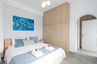 Posteľ alebo postele v izbe v ubytovaní TIFFANYS VILLAS