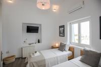 Posteľ alebo postele v izbe v ubytovaní TIFFANYS VILLAS