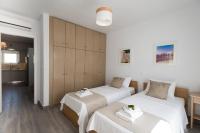 Posteľ alebo postele v izbe v ubytovaní TIFFANYS VILLAS