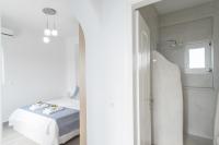 Posteľ alebo postele v izbe v ubytovaní TIFFANYS VILLAS