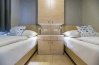 Posteľ alebo postele v izbe v ubytovaní Mobile Homes Krk Silo