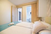 Posteľ alebo postele v izbe v ubytovaní Mobile Homes Krk Silo