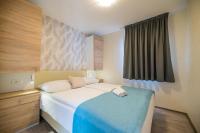 Posteľ alebo postele v izbe v ubytovaní Mobile Homes Krk Silo