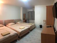 Postel nebo postele na pokoji v ubytování TK Guesthouse