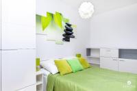 Postel nebo postele na pokoji v ubytování Jantar Apartamenty - Family Vacation Polanki