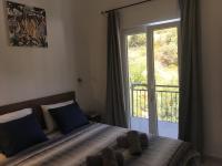 Postel nebo postele na pokoji v ubytování RIVA Seafront holiday apartments