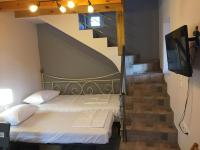 Postel nebo postele na pokoji v ubytování Villa Maria Kythera