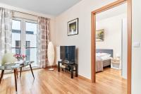Posteľ alebo postele v izbe v ubytovaní Exclusive Apartments Marina by Noclegi Renters