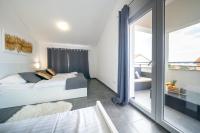 Posteľ alebo postele v izbe v ubytovaní Holiday Apartments Amarilis
