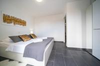Posteľ alebo postele v izbe v ubytovaní Holiday Apartments Amarilis
