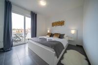 Posteľ alebo postele v izbe v ubytovaní Holiday Apartments Amarilis