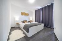 Posteľ alebo postele v izbe v ubytovaní Holiday Apartments Amarilis