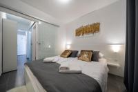 Posteľ alebo postele v izbe v ubytovaní Holiday Apartments Amarilis