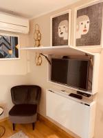 TV a/nebo společenská místnost v ubytování Apartment Luxury Palace No1