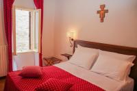 Łóżko lub łóżka w pokoju w obiekcie Hotel Pax