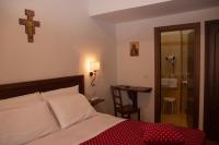 Łóżko lub łóżka w pokoju w obiekcie Hotel Pax