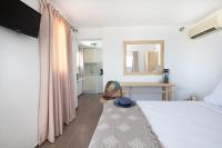 Posteľ alebo postele v izbe v ubytovaní Central Suites Mykonos