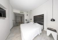 Postel nebo postele na pokoji v ubytování Belussi Exclusive Suites