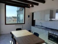 A kitchen or kitchenette at Palazzo del Golfo Penthouse