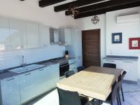 A kitchen or kitchenette at Palazzo del Golfo Penthouse