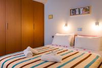 Posteľ alebo postele v izbe v ubytovaní La Casa di Pietra Villas