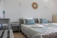 Łóżko lub łóżka w pokoju w obiekcie Thea-tro Apartments