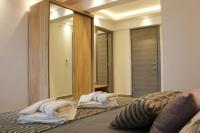 Łóżko lub łóżka w pokoju w obiekcie Thea-tro Apartments