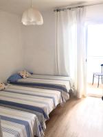 Posteľ alebo postele v izbe v ubytovaní Apartment Aptucat