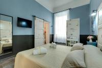 A bed or beds in a room at Al Consolato - Guest house