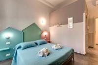 A bed or beds in a room at Al Consolato - Guest house