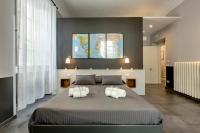 A bed or beds in a room at Al Consolato - Guest house