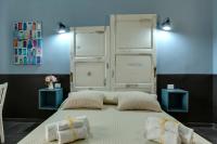 A bed or beds in a room at Al Consolato - Guest house