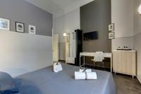 A bed or beds in a room at Al Consolato - Guest house