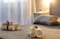 A bed or beds in a room at Al Consolato - Guest house