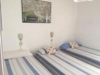 Posteľ alebo postele v izbe v ubytovaní Apartment Aptucat