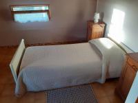 A bed or beds in a room at B & B Country House