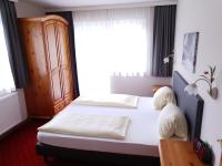 Posteľ alebo postele v izbe v ubytovaní Aparthotel Pichler