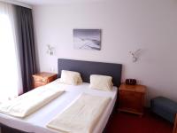 Posteľ alebo postele v izbe v ubytovaní Aparthotel Pichler
