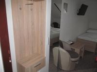 A bed or beds in a room at A+S Penzion Podzamok