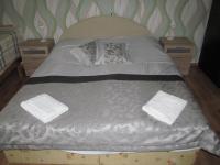 A bed or beds in a room at A+S Penzion Podzamok