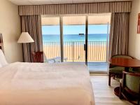 Atlantic Oceanfront Hotel, Wells Beachにあるベッド