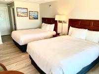 Atlantic Oceanfront Hotel, Wells Beachにあるベッド