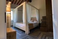 Postel nebo postele na pokoji v ubytování Agriturismo Galenzana