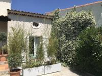 a house with plants in front of it at Plan de Cuques T2 in Marseille