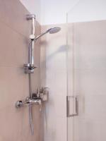 A bathroom at Central Point by Zoom Apartments